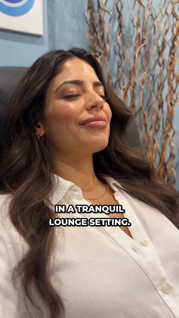 Frame from a short-form vertical video on a zero-gravity lounge treatment setting.